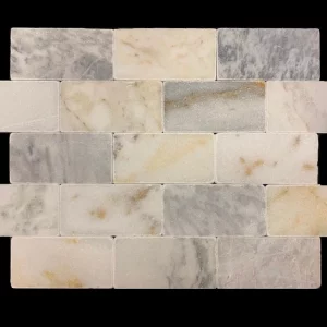 MARMURA MUGLA WHITE - 7.5x15x1 cm, alb natural cu nuanțe gri, finisaj antichizat, tumbled, pentru interior si exterior.