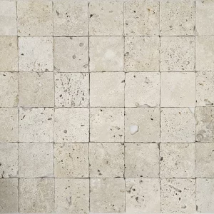 TRAVERTIN LIGHT - 10X10x1 cm, în nuanțe deschise de crem și bej, cu finisaj antichizat și textură natural, ideal pentru amenajări cu stil clasic, rustic sau mediteranean.