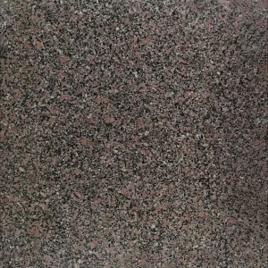 GRANIT RH POLISHED - 60X60X1.8 cm, finisaj lucios (polished), in nuante de roșiatic închis cu granulație gri și neagră, un material natural elegant și durabil, ideal pentru amenajări interioare și exterioare de impact vizual.