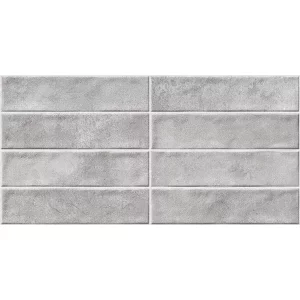 FAIANTA ROLINDA DK (22244-B) - 30X60 cm, ceramica glazurata, rectificata, adaugă profunzime și caracter spațiilor interioare prin textura sa urbană și nuanța gri închis cu finisaj lucios.