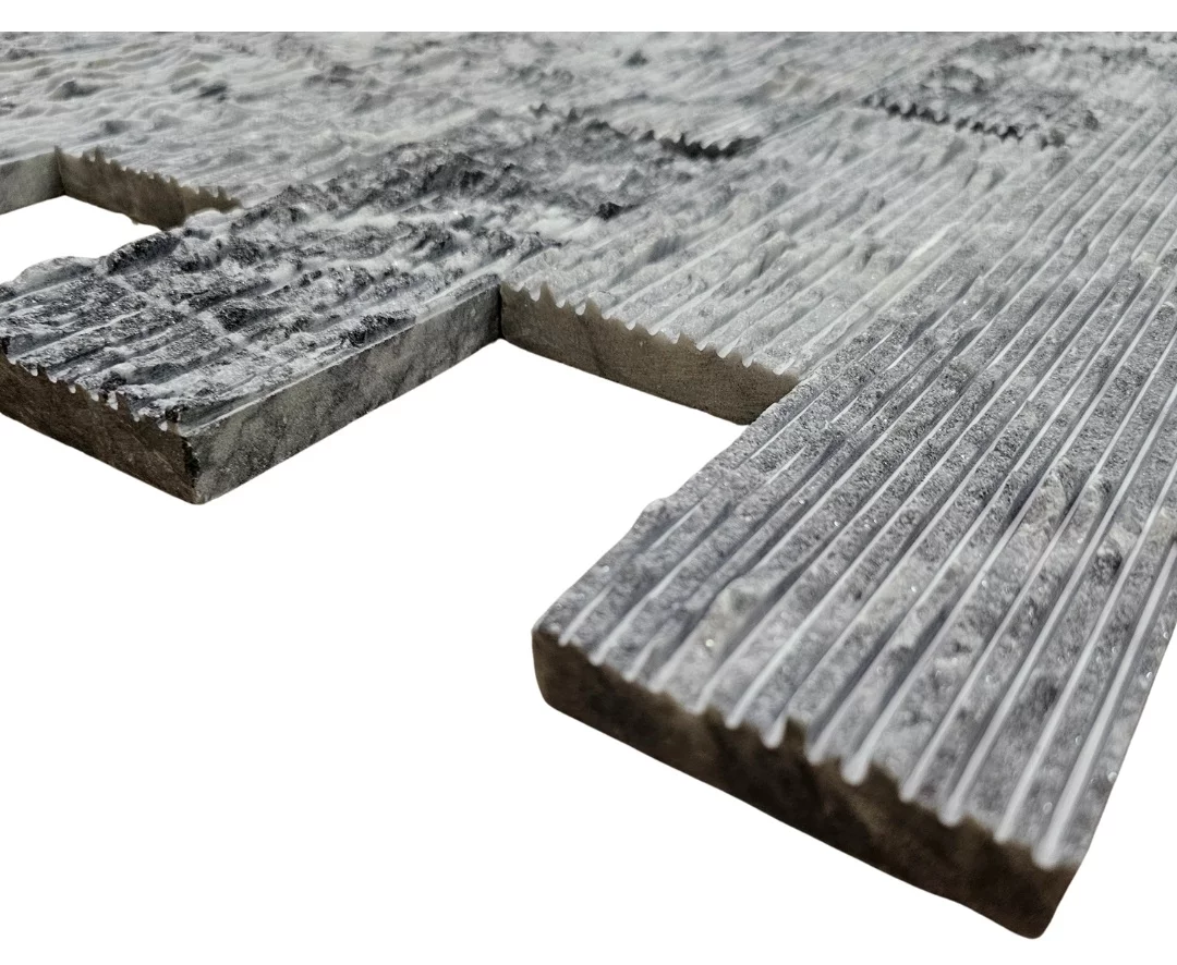MARMURA DECORATIVA GREY RIZATA - 7.5X20.3 cm, grosime variabila 1.2–1.5 cm, nuanță gri,  ideală pentru placări verticale interioare sau exterioare, finisaj striat cu efect vizual contemporan și textură elegantă.