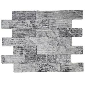 MARMURA DECORATIVA GREY RIZATA - 7.5X20.3 cm, grosime variabila 1.2–1.5 cm, nuanță gri,  ideală pentru placări verticale interioare sau exterioare, finisaj striat cu efect vizual contemporan și textură elegantă.