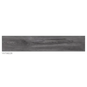 GRESIE STORM GREY YX158228 - 15X80 cm, porțelanată soft-matt, nerectificata, în nuanțe de gri antracit, cu textură realistă de lemn, pentru un decor modern și natural.