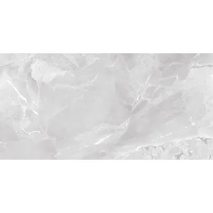 FAIANTA CLEVER GREY 15276-L - 30X60 cm, ceramica glazurata, rectificata, impresionează prin nuanțele sale elegante de gri deschis și textura care imită marmura naturală, cu un finisaj lucios care reflectă lumina și adaugă profunzime spațiului.